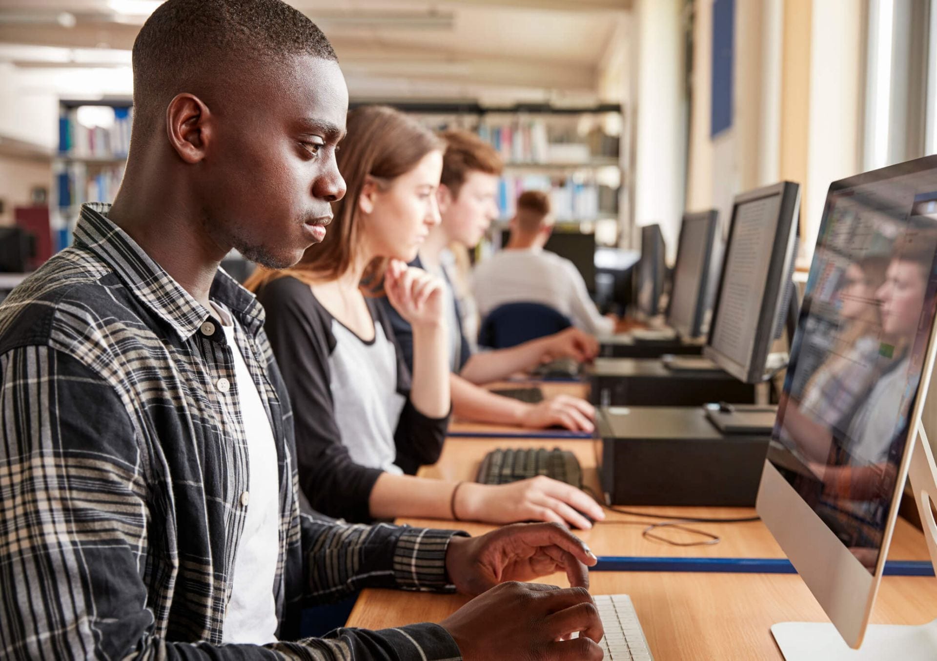 OER Header (1)-1gjz947 various students working at computers in a lab setting